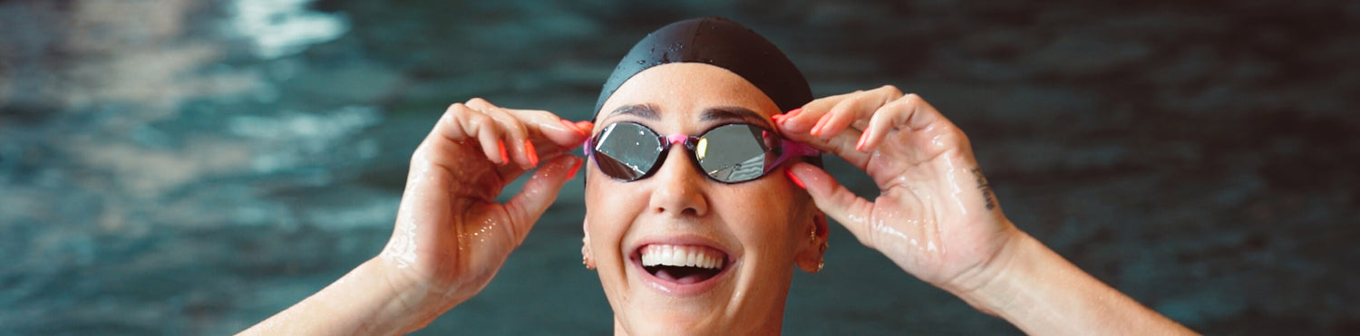 Jeanette Ottesen swimming with custom fit goggles