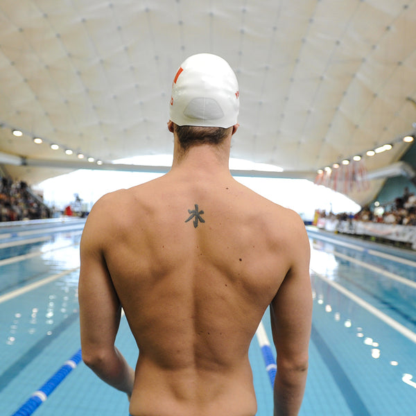 Can you really trust swimming after a new tattoo? Let us show the facts