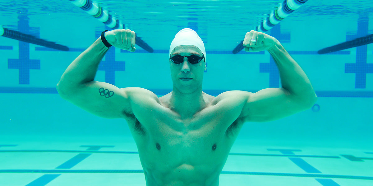 Matt Grevers flexes his muscle