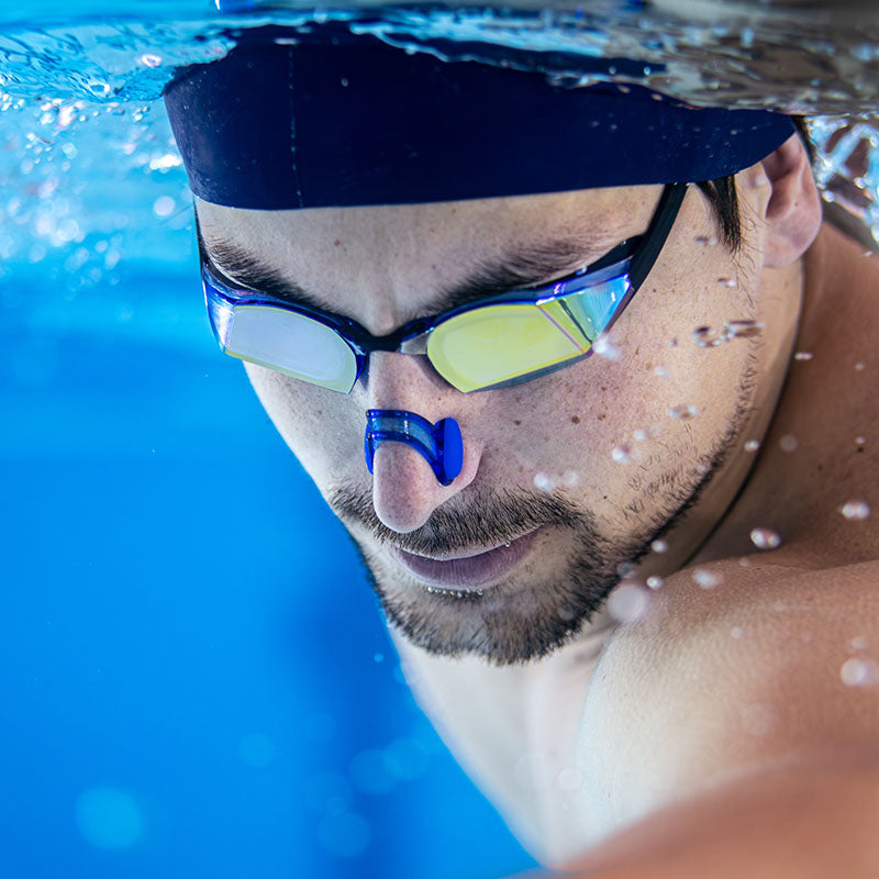 Swimmer Using THEMAGIC5 Nose Clip Underwater