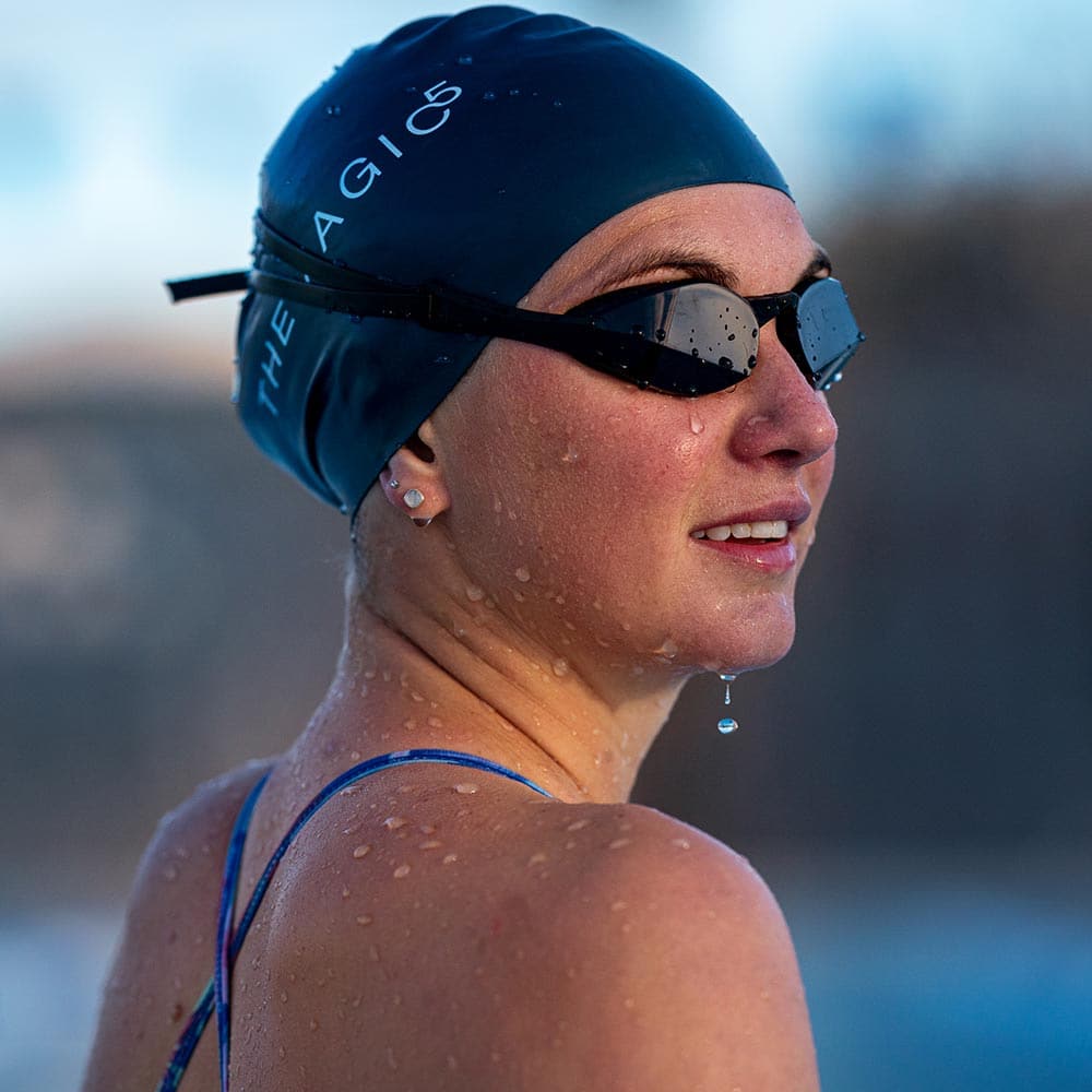 Swimmer wearing Black Magic goggles outdoors after a swim
