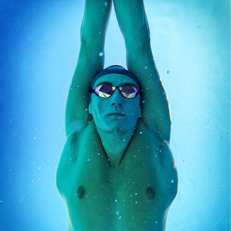 Swimmer streamlining underwater wearing LIMITED EDITION PINK GOLD